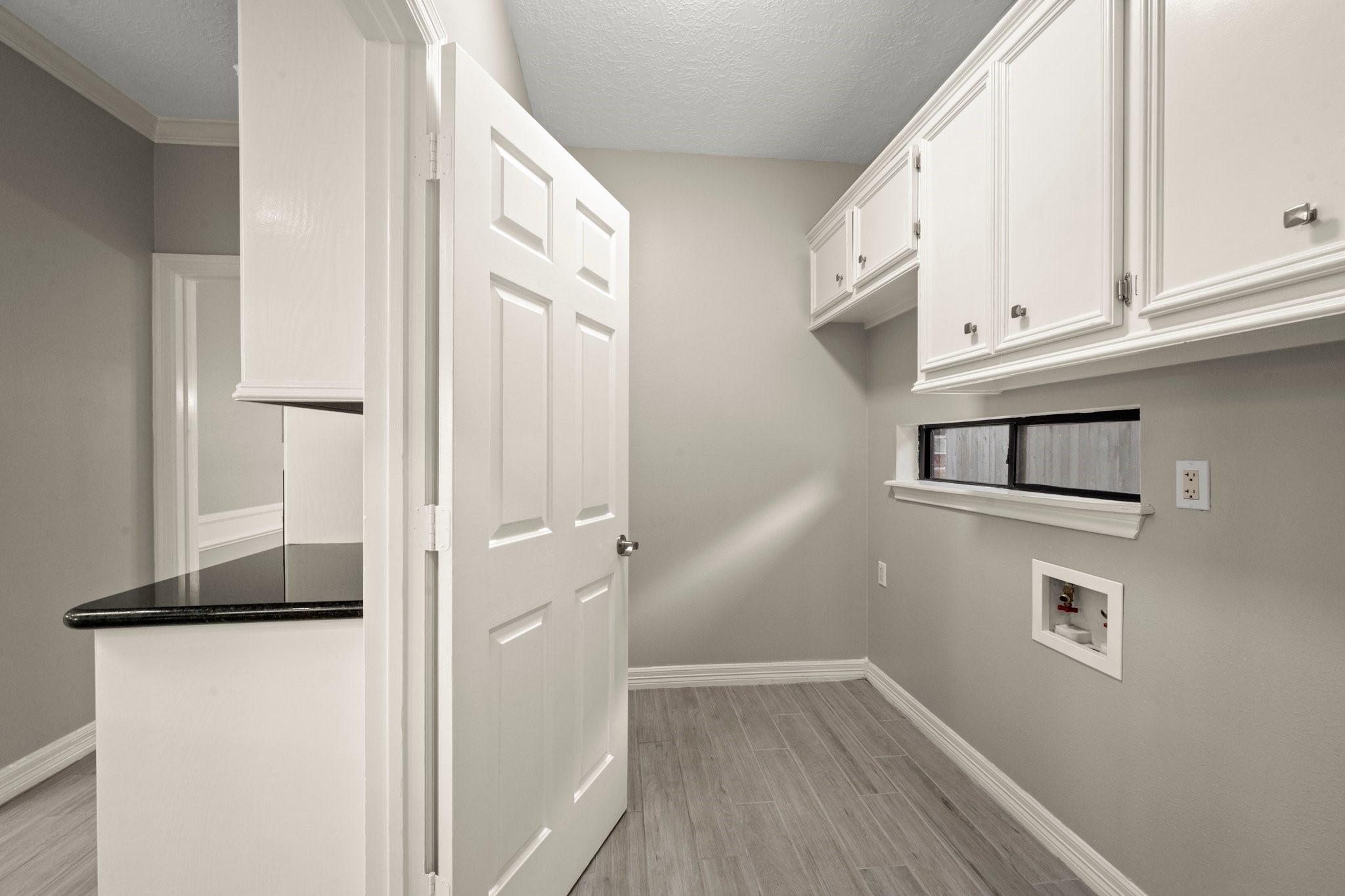 8222 Redchurch Drive Spring, TX 77379 - Photo 23 of 36 a view of a kitchen from the hallway