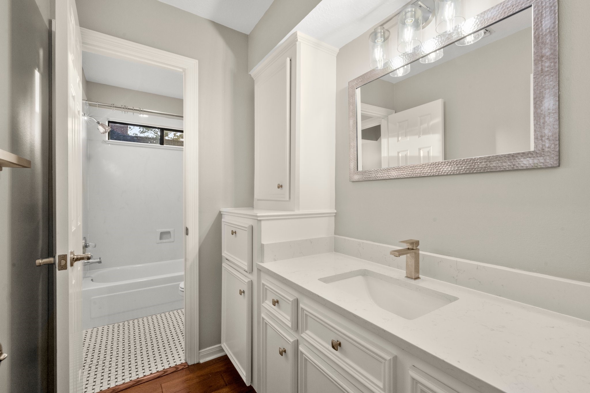8222 Redchurch Drive Spring, TX 77379 - Photo 28 of 36 a bathroom with a sink vanity granite and a mirror