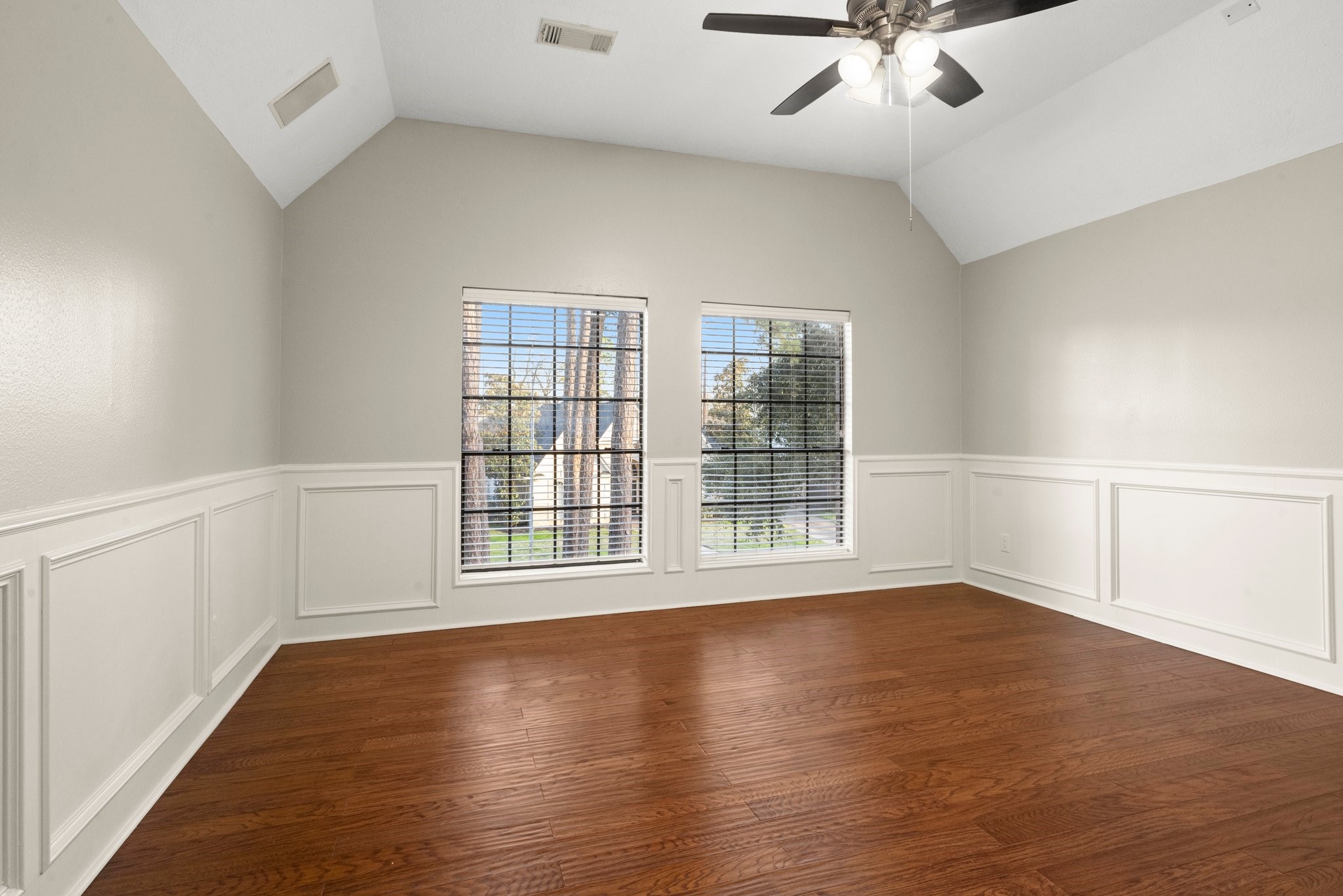 8222 Redchurch Drive Spring, TX 77379 - Photo 31 of 36 wooden floor in an empty room with a window