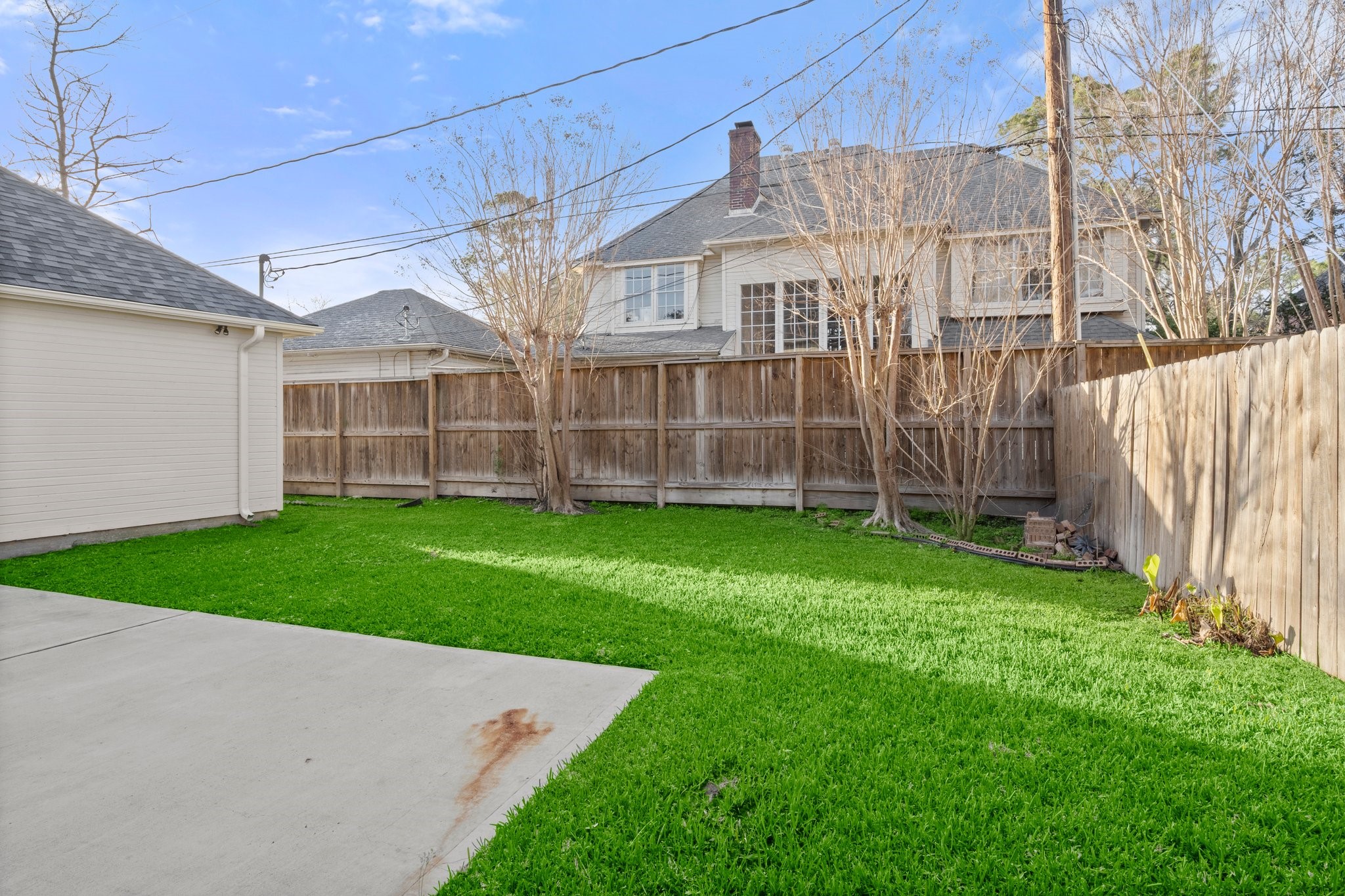 8222 Redchurch Drive Spring, TX 77379 - Photo 35 of 36 a view of a house with a backyard