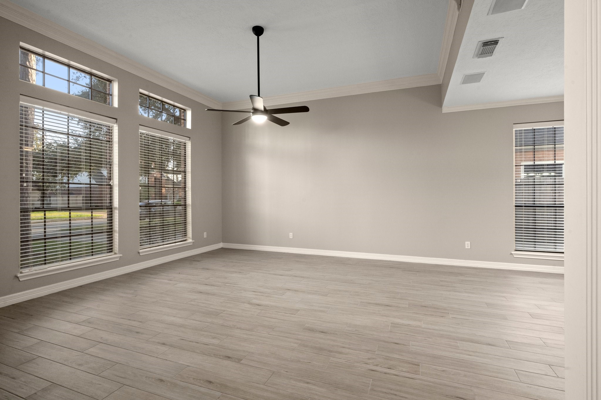 8222 Redchurch Drive Spring, TX 77379 - Photo 7 of 36 a view of an empty room with a window