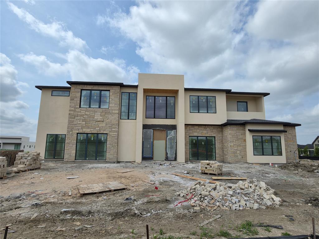 110 Timber Cv Place Heath, TX 75032 - Photo 2 of 15 a front view of a house with a yard