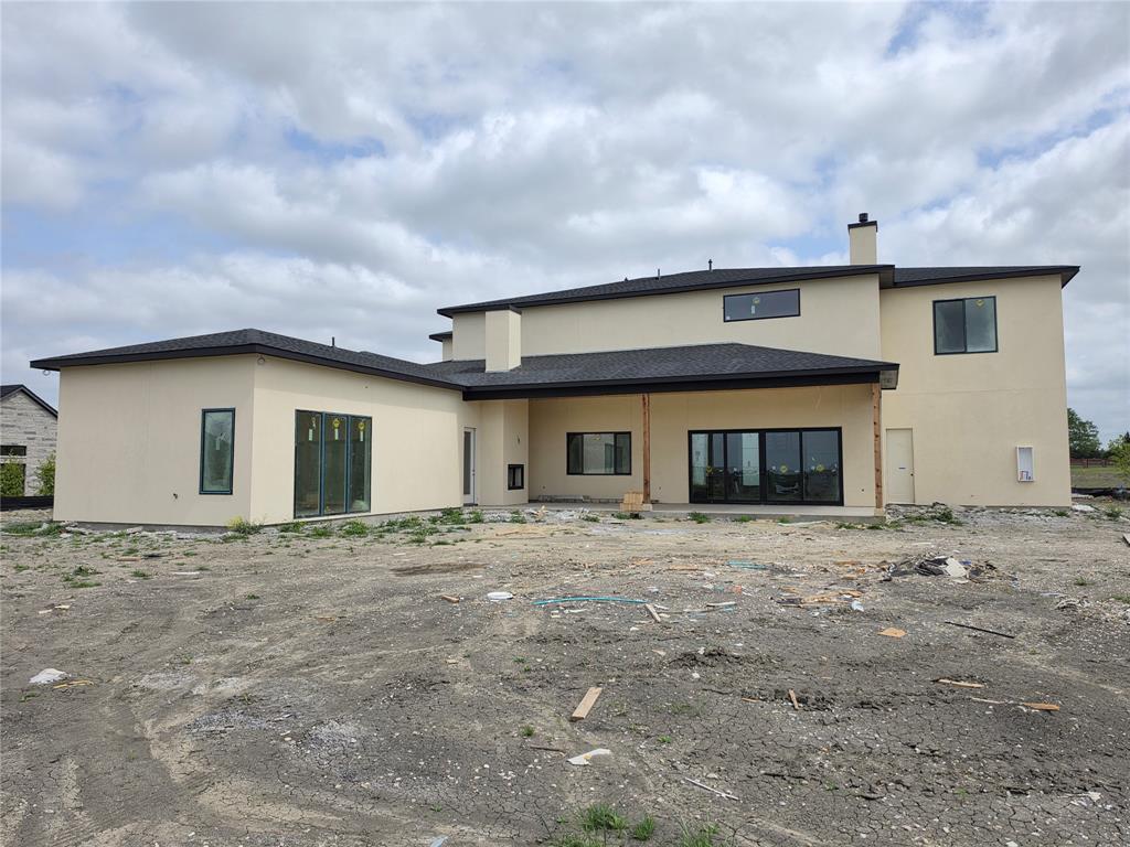 110 Timber Cv Place Heath, TX 75032 - Photo 7 of 15 a big house with an outdoor space