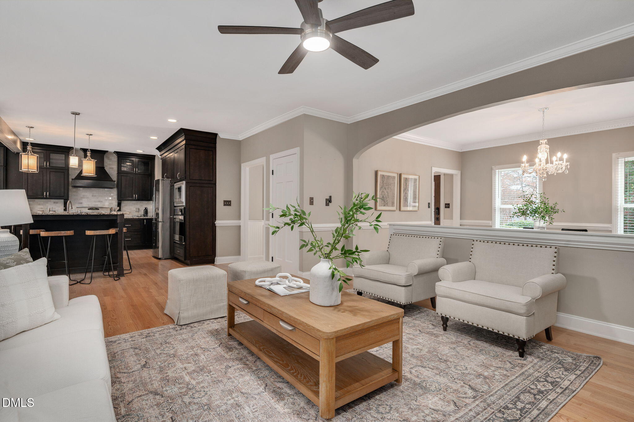 8325 Stryker Court Raleigh, NC 27615 - Photo 17 of 53 a living room with furniture and view of kitchen
