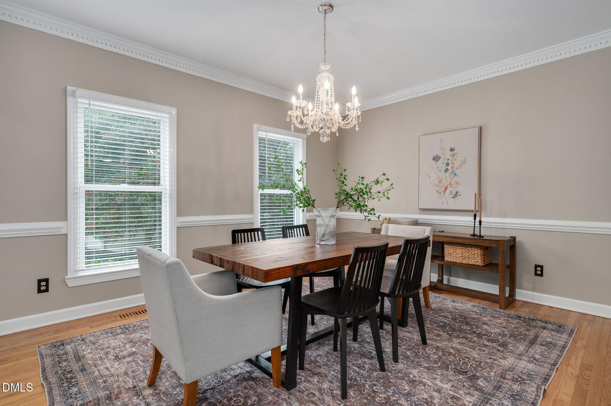 8325 Stryker Court Raleigh, NC 27615 - Photo 18 of 53 a view of a dining room with furniture window and wooden floor
