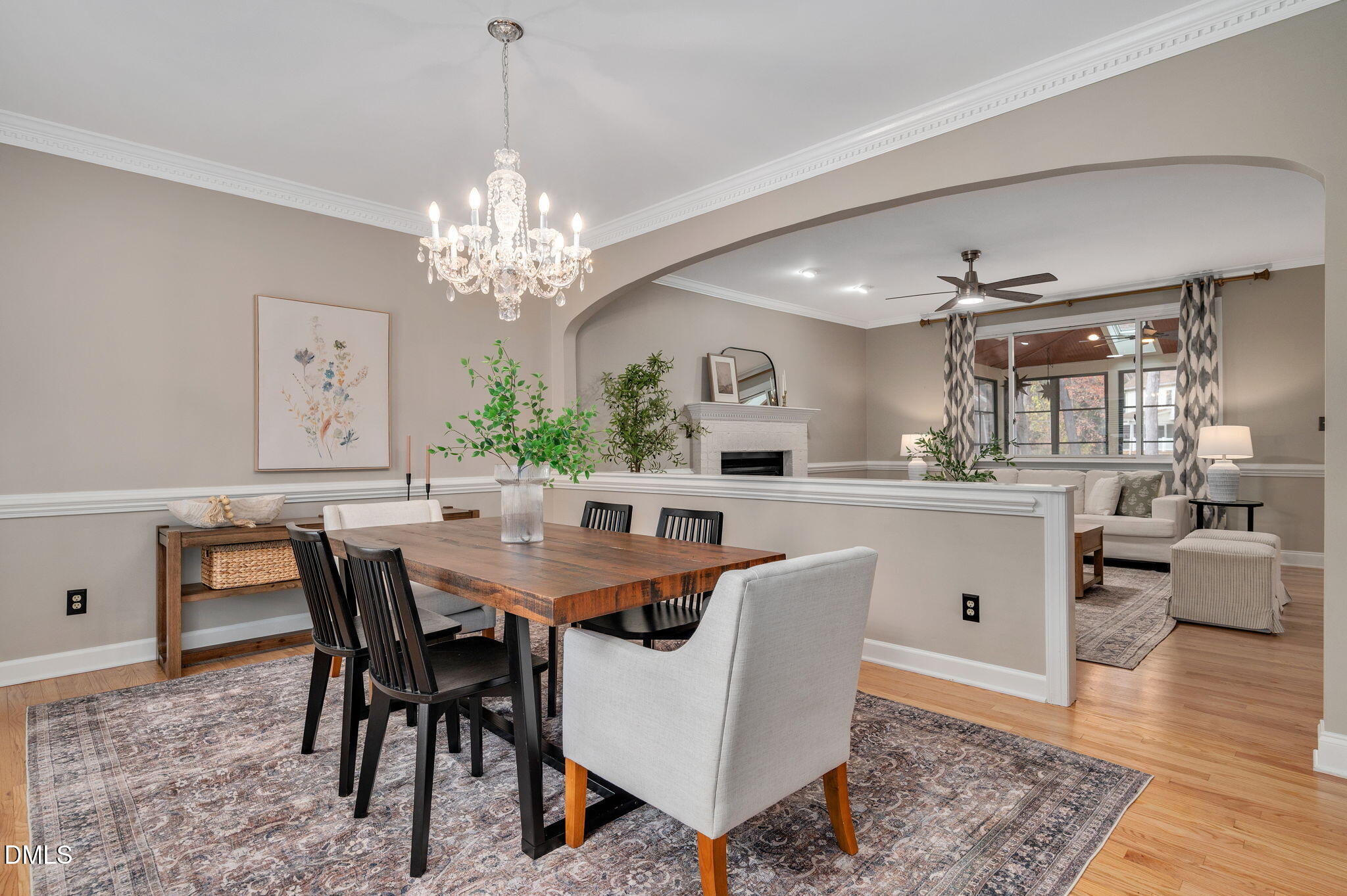 8325 Stryker Court Raleigh, NC 27615 - Photo 19 of 53 a view of a dining room with furniture and wooden floor