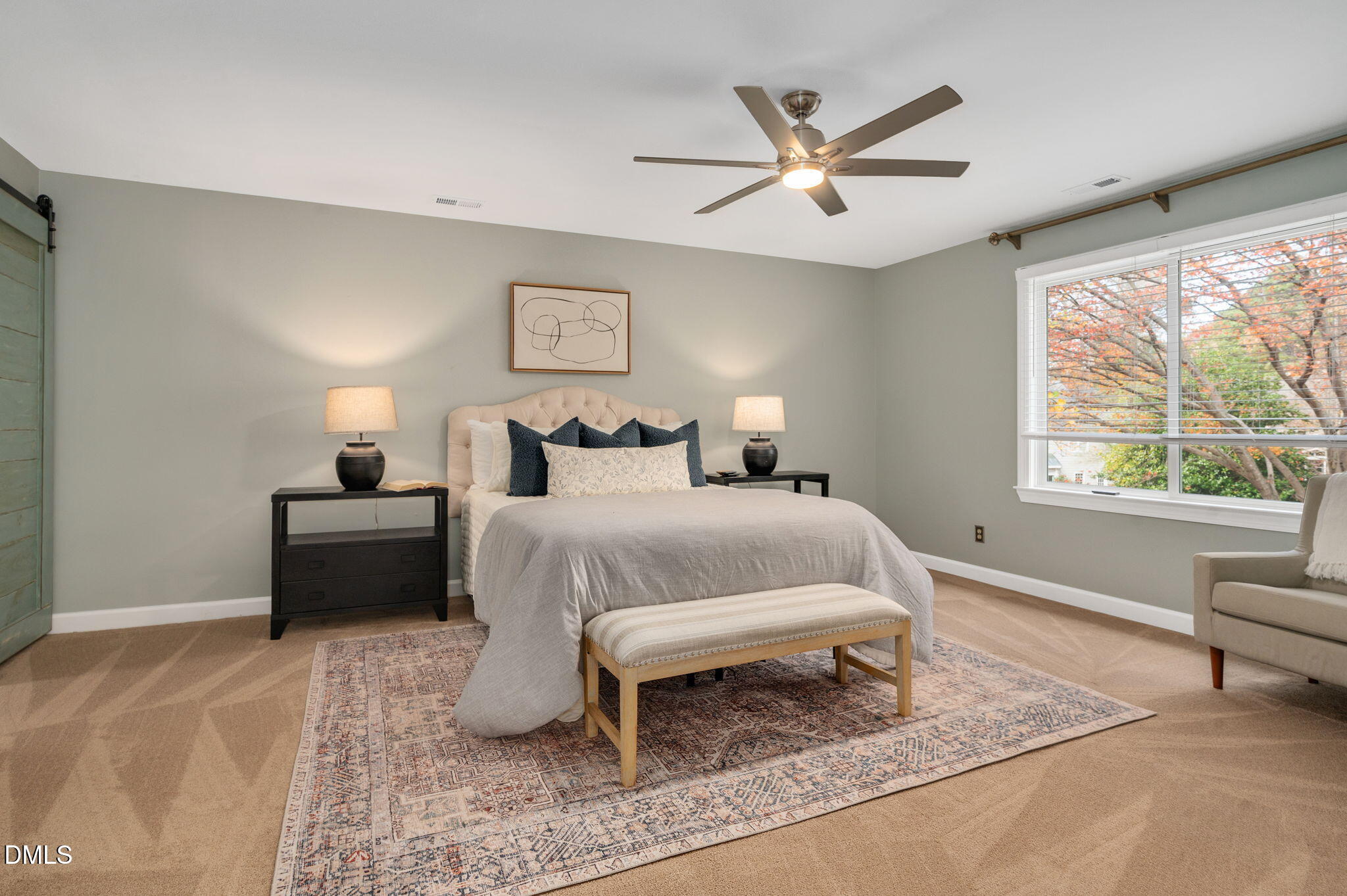 8325 Stryker Court Raleigh, NC 27615 - Photo 22 of 53 a bedroom with a bed and window