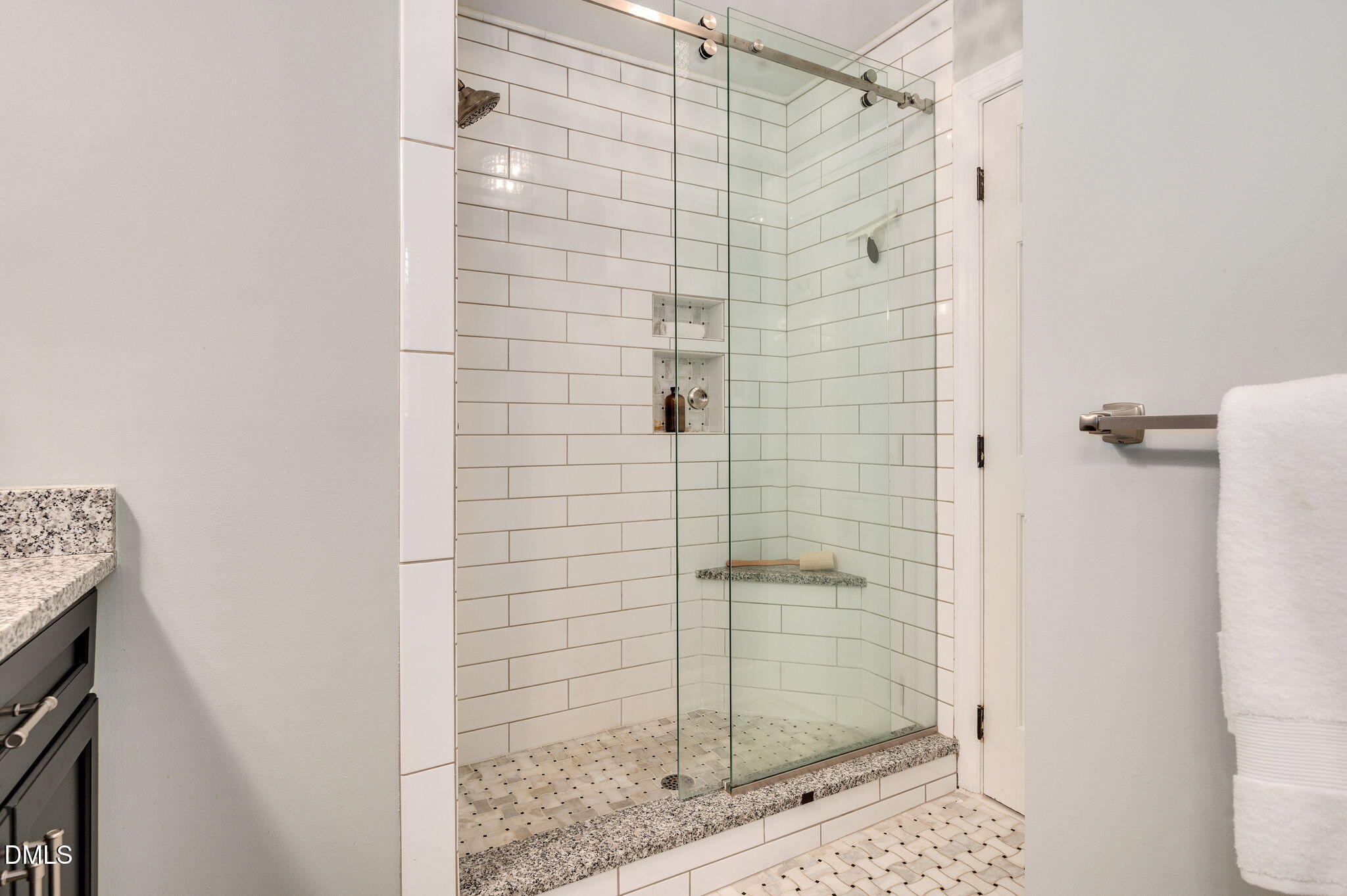 8325 Stryker Court Raleigh, NC 27615 - Photo 26 of 53 a bathroom with a shower
