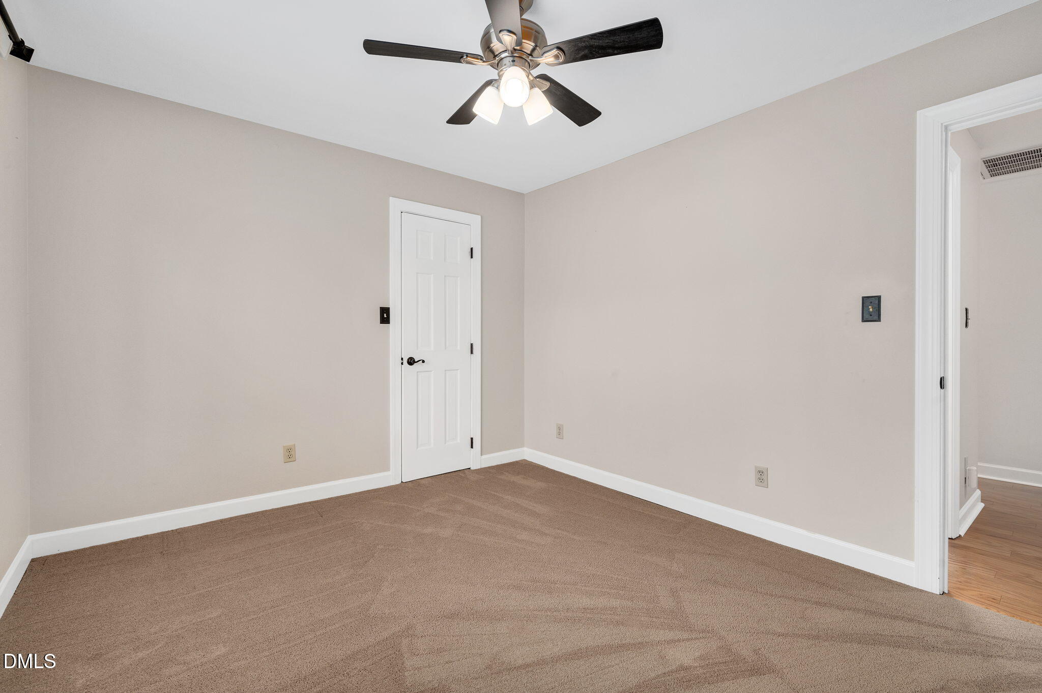 8325 Stryker Court Raleigh, NC 27615 - Photo 28 of 53 an empty room with chandelier fan