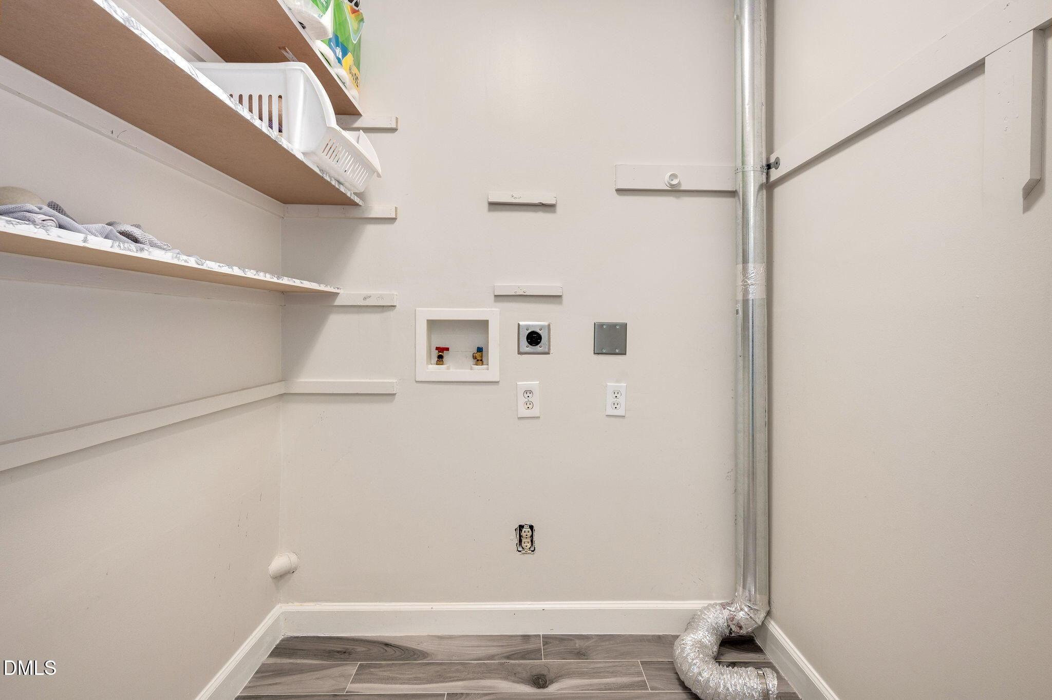 8325 Stryker Court Raleigh, NC 27615 - Photo 32 of 53 a view of utility room