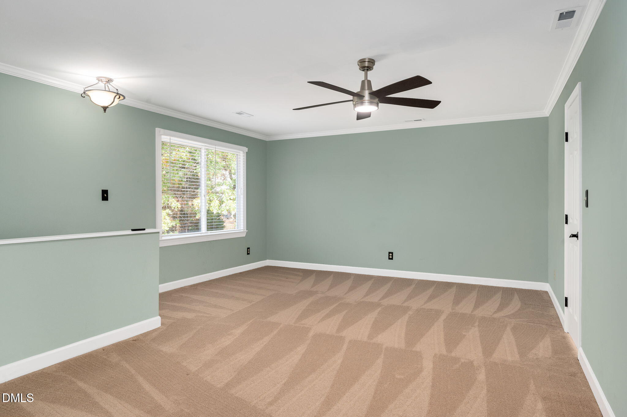 8325 Stryker Court Raleigh, NC 27615 - Photo 33 of 53 a view of an empty room with a window