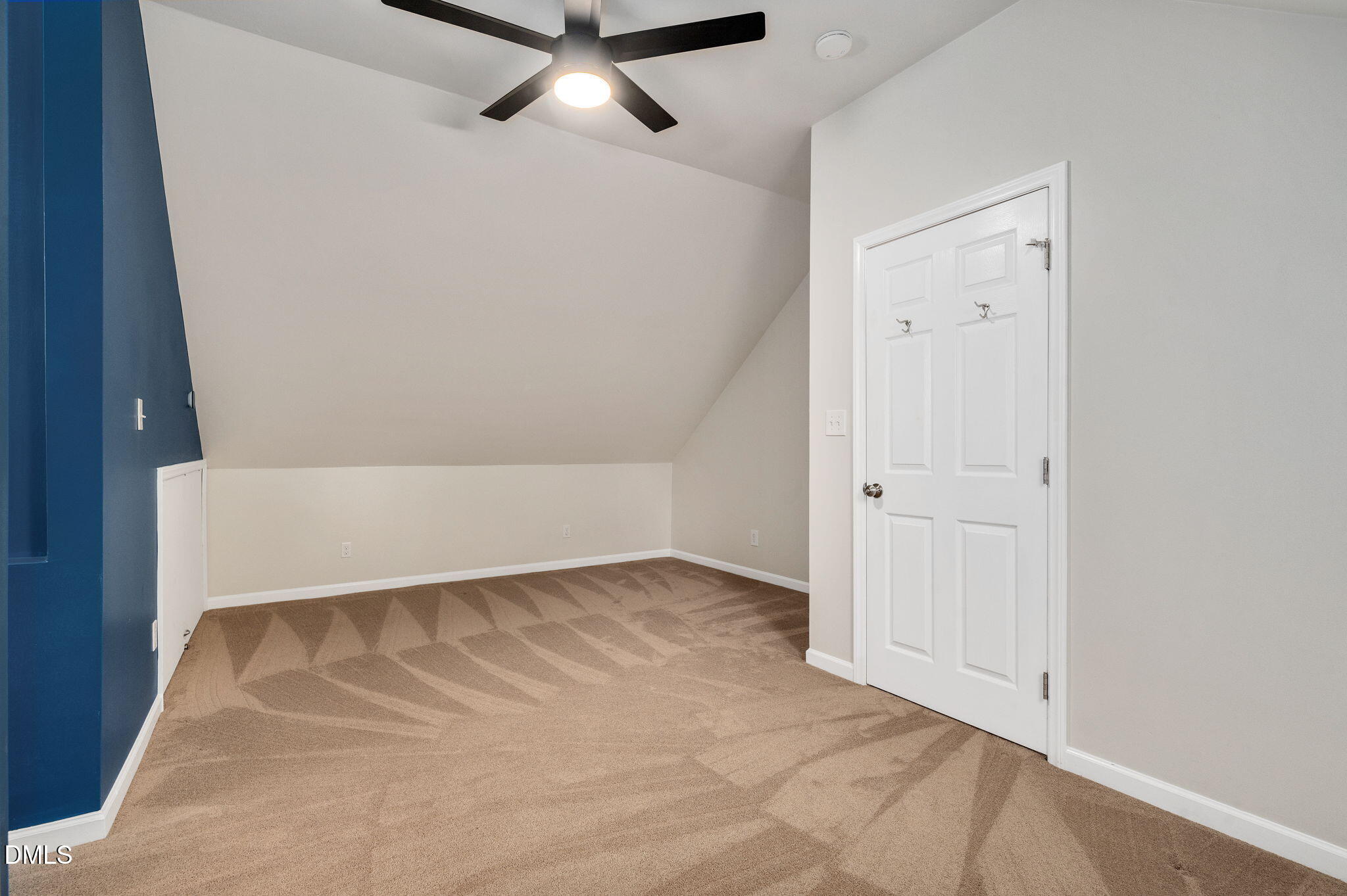 8325 Stryker Court Raleigh, NC 27615 - Photo 36 of 53 an empty room with a workbench