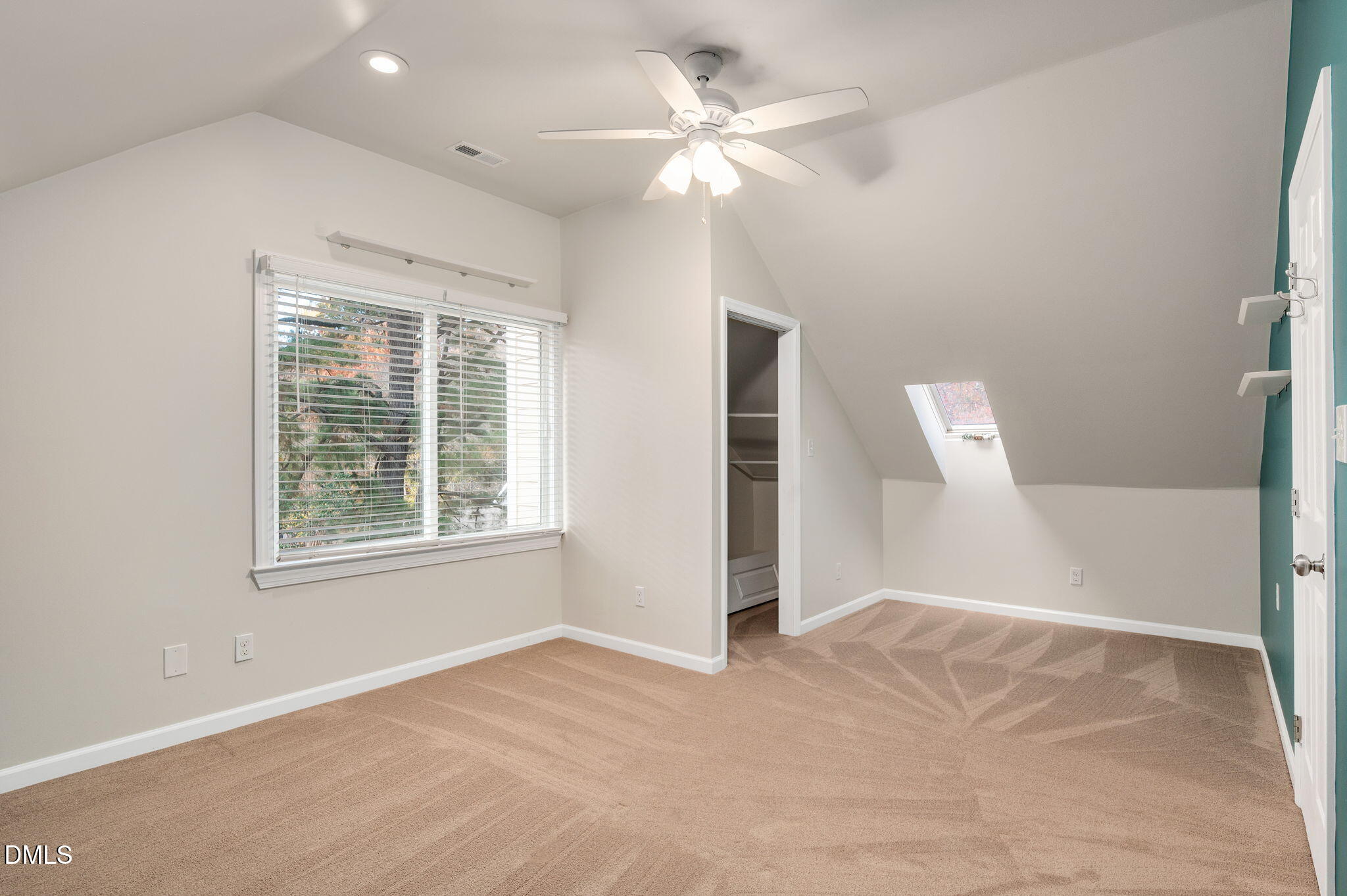 8325 Stryker Court Raleigh, NC 27615 - Photo 39 of 53 an empty room with fan and windows