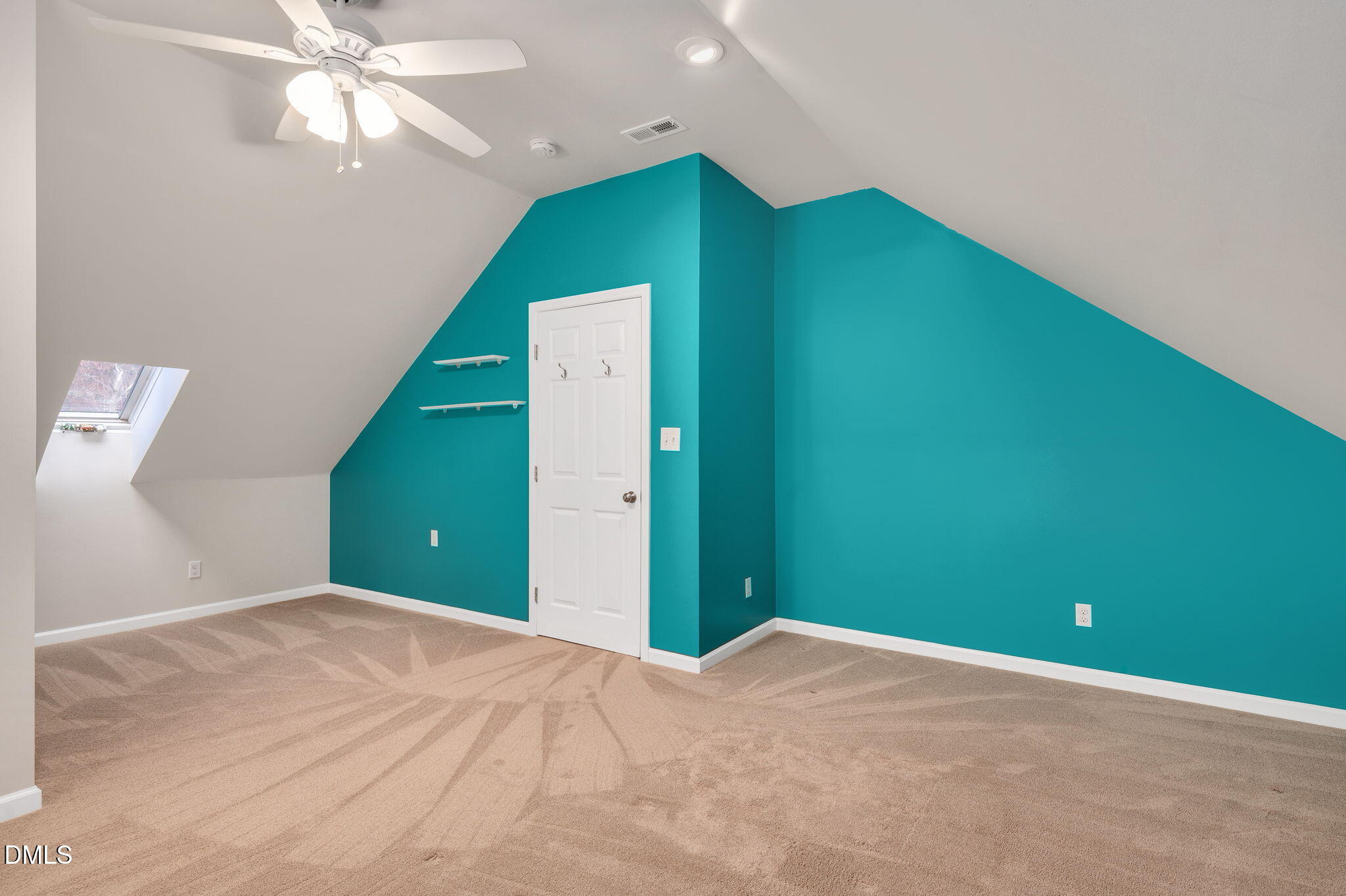 8325 Stryker Court Raleigh, NC 27615 - Photo 40 of 53 a view of a big room with closet and fan