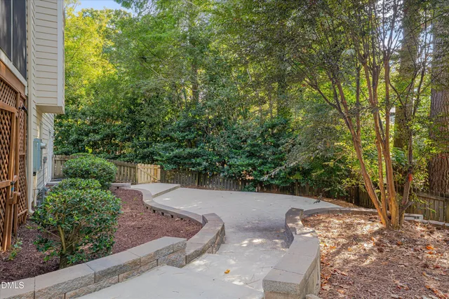 a view of a backyard with a patio