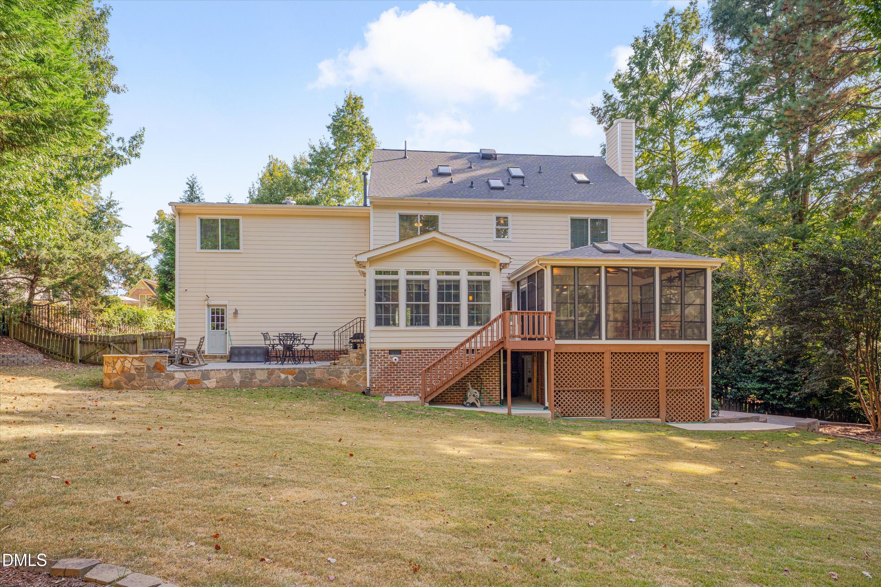 8325 Stryker Court Raleigh, NC 27615 - Photo 51 of 53 a front view of a house with a yard and garage