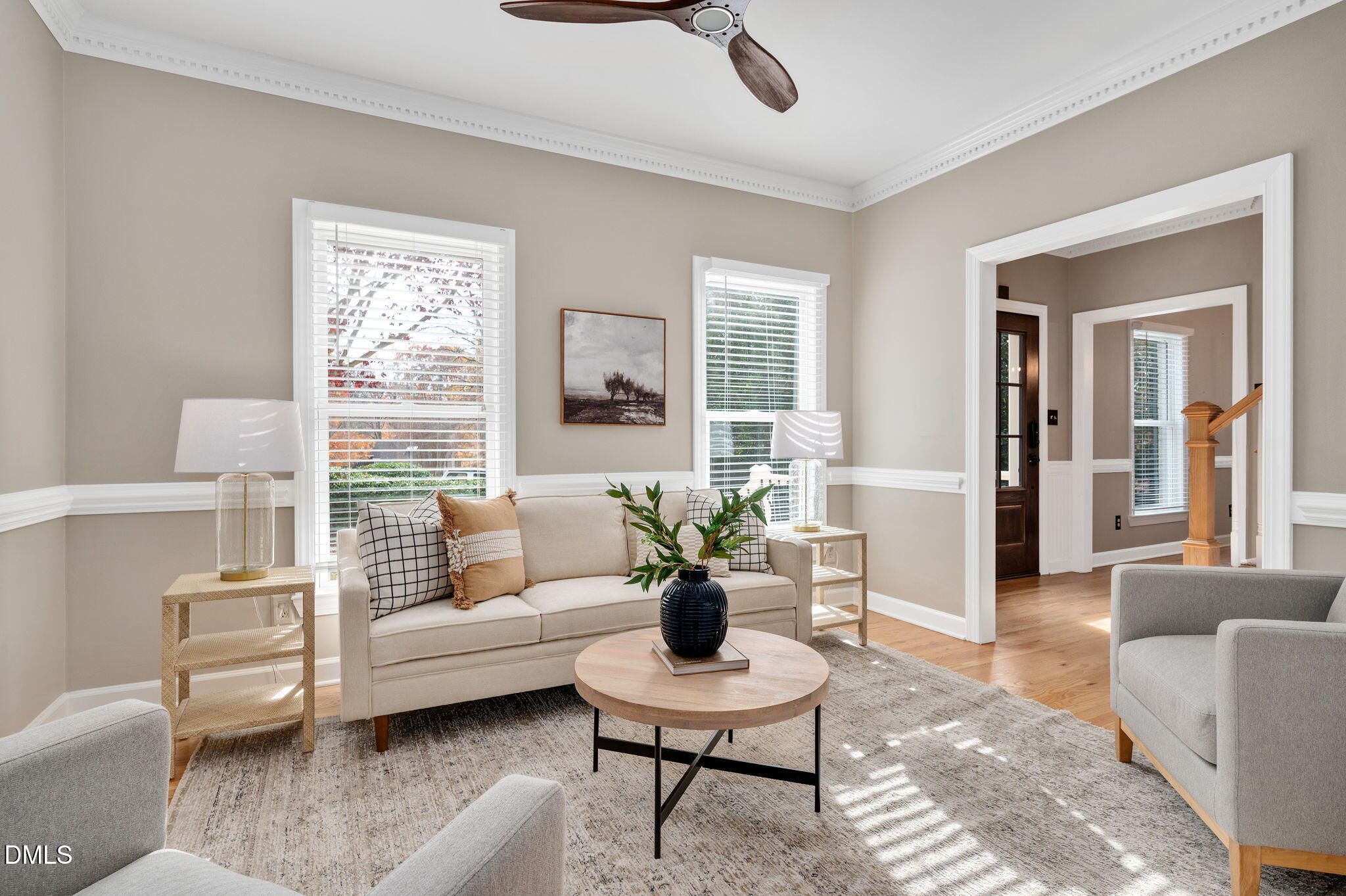 8325 Stryker Court Raleigh, NC 27615 - Photo 7 of 53 a living room with furniture and a potted plant