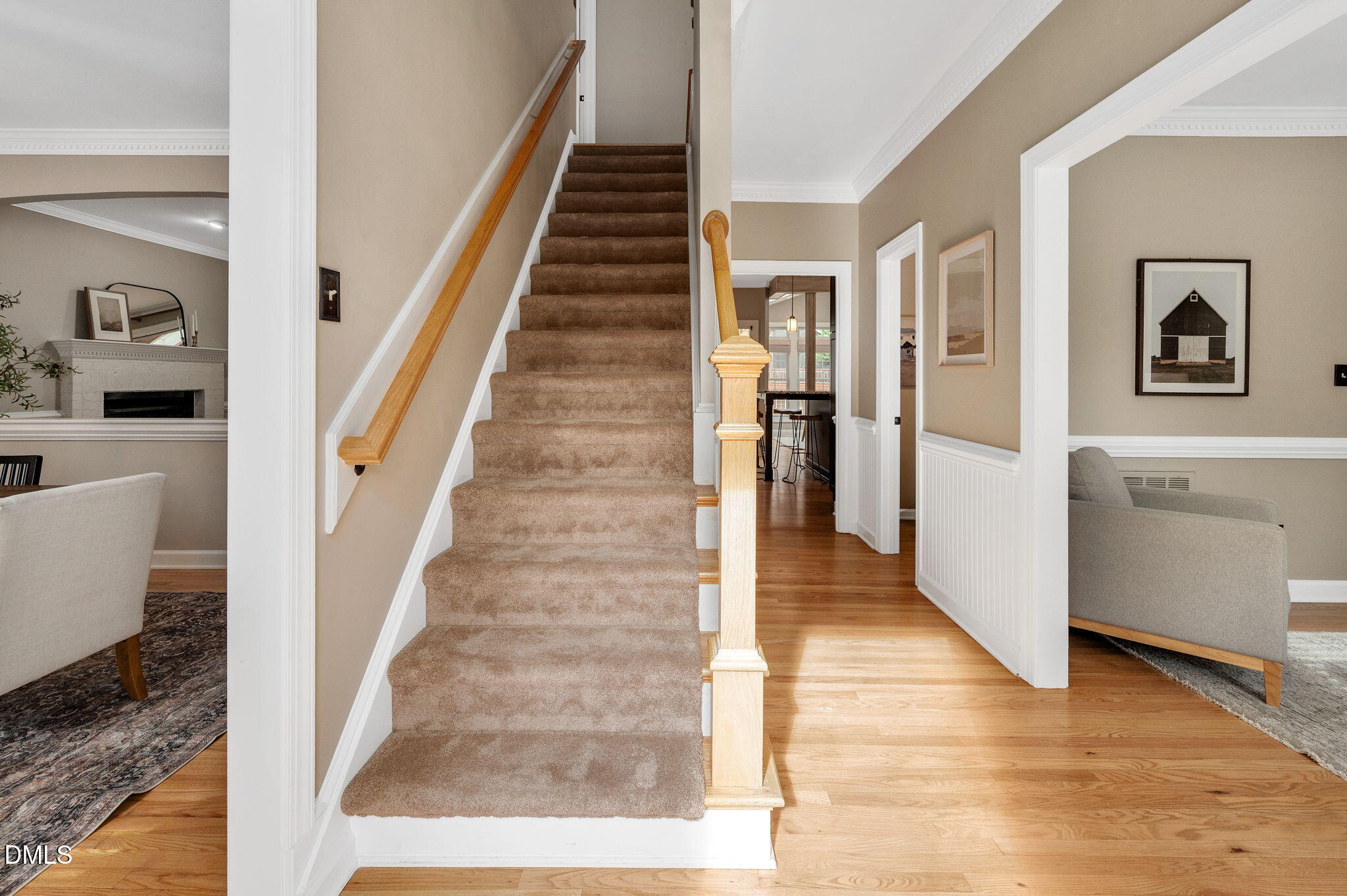 8325 Stryker Court Raleigh, NC 27615 - Photo 8 of 53 a view of a hallway with wooden floor and entryway