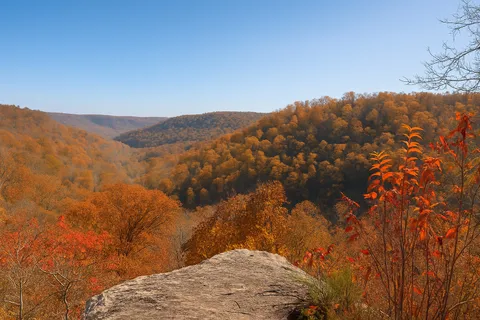 a view of mountains and valleys