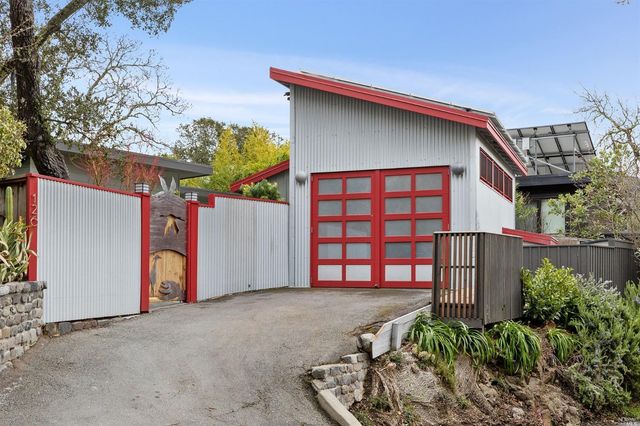 a front view of a house with a garage