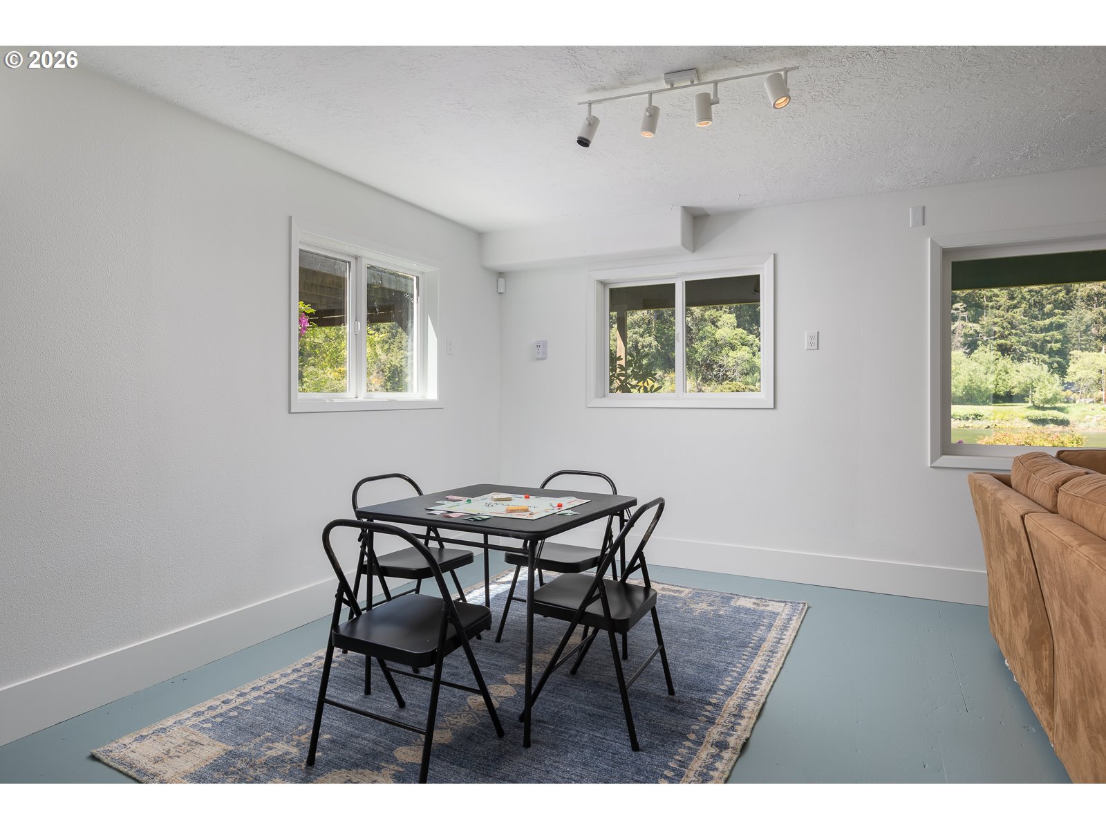 34098 Brooten Road Pacific City, OR 97135 - Photo 26 of 38 a view of a dining room with furniture and a window