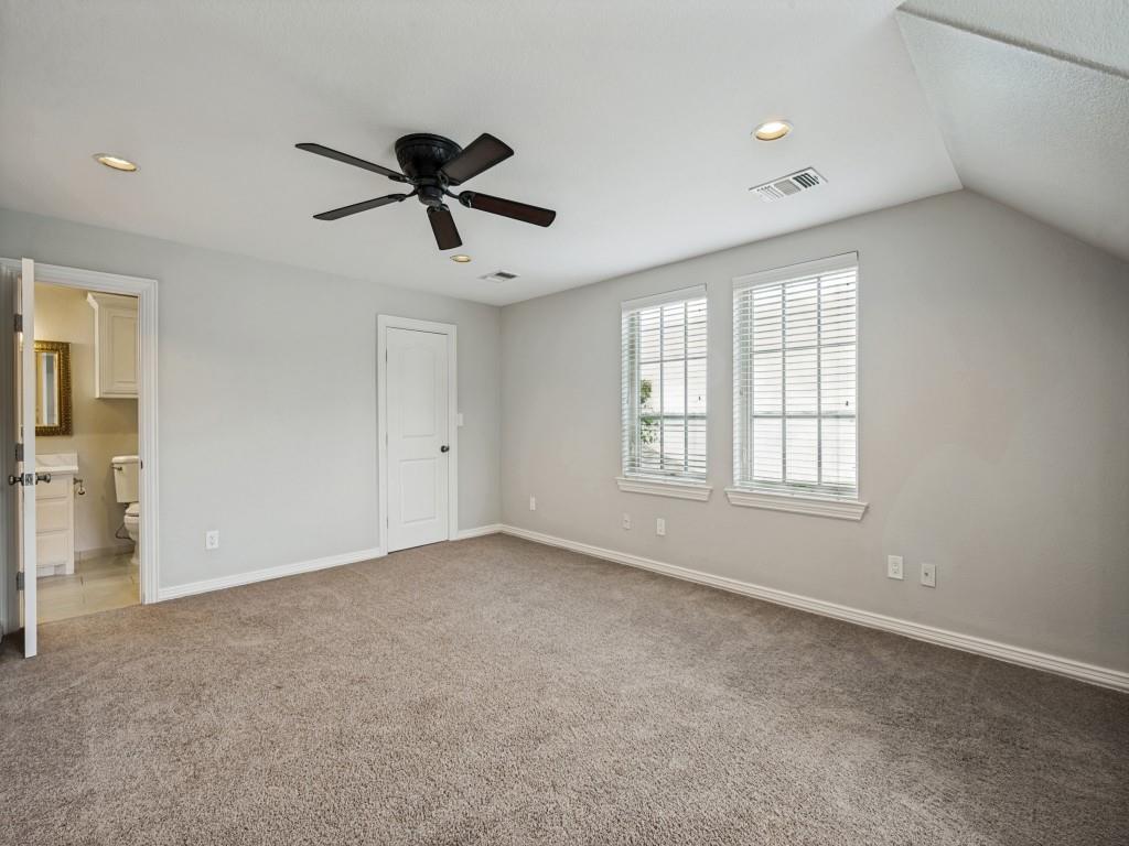 5975 Diamond Spur Frisco, TX 75036 - Photo 26 of 40 a view of a livingroom with a ceiling fan & windows