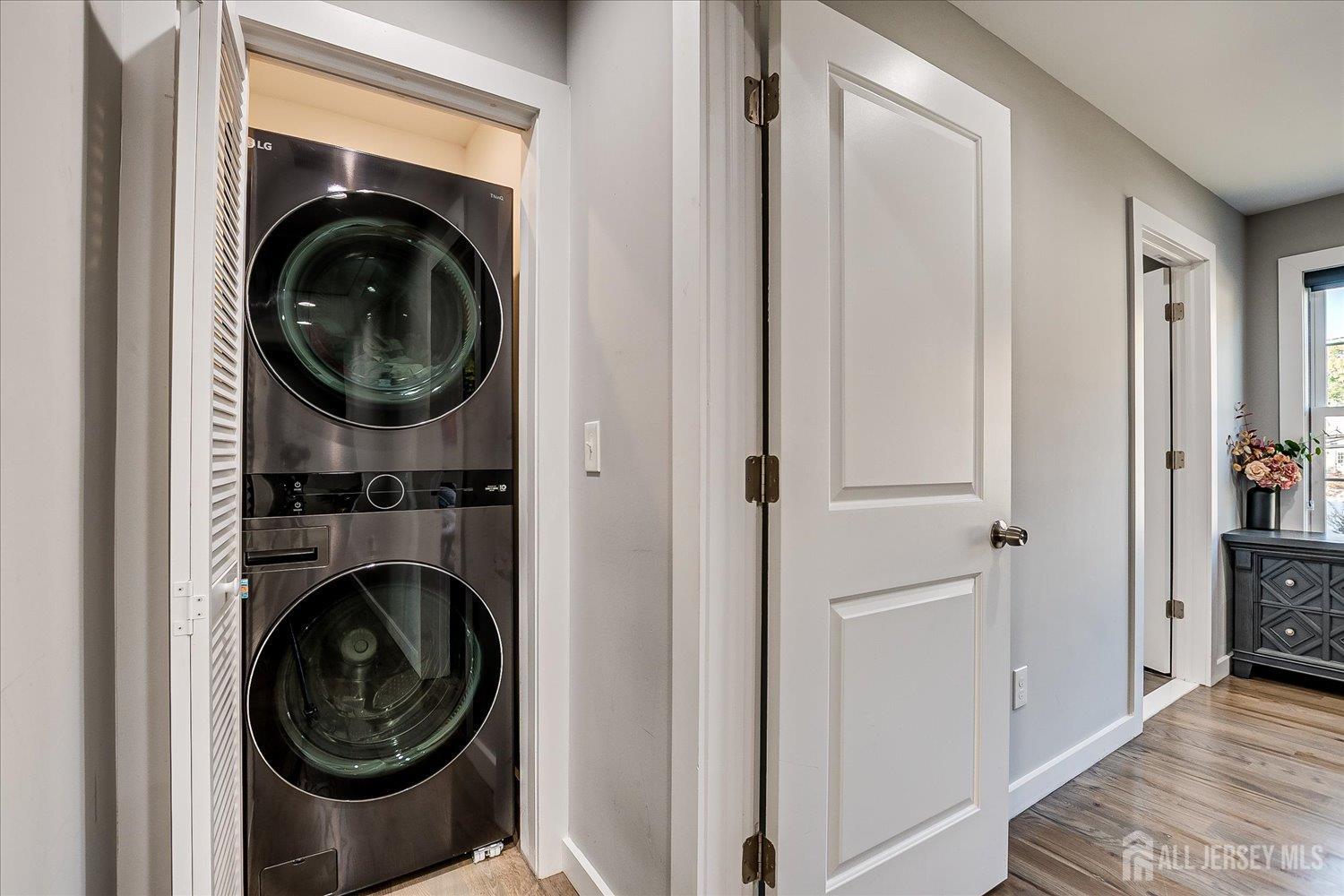 191 Hoover Avenue Edison, NJ 08837 - Photo 25 of 40 a view of a hallway with washer and dryer