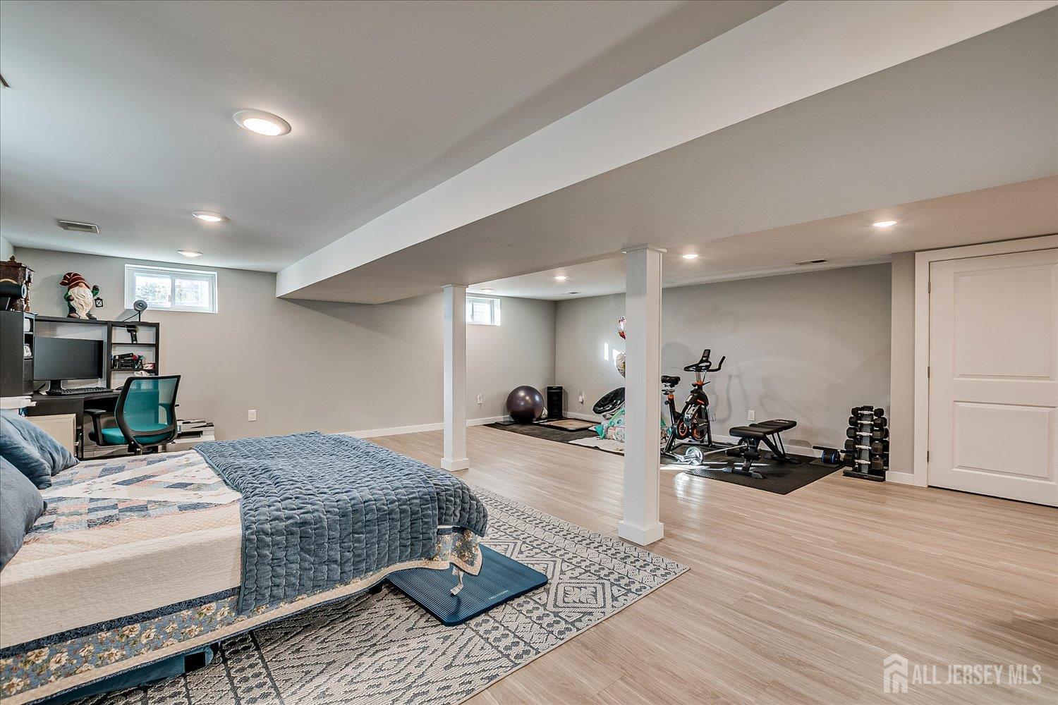 191 Hoover Avenue Edison, NJ 08837 - Photo 33 of 40 a living room with furniture and a wooden floor