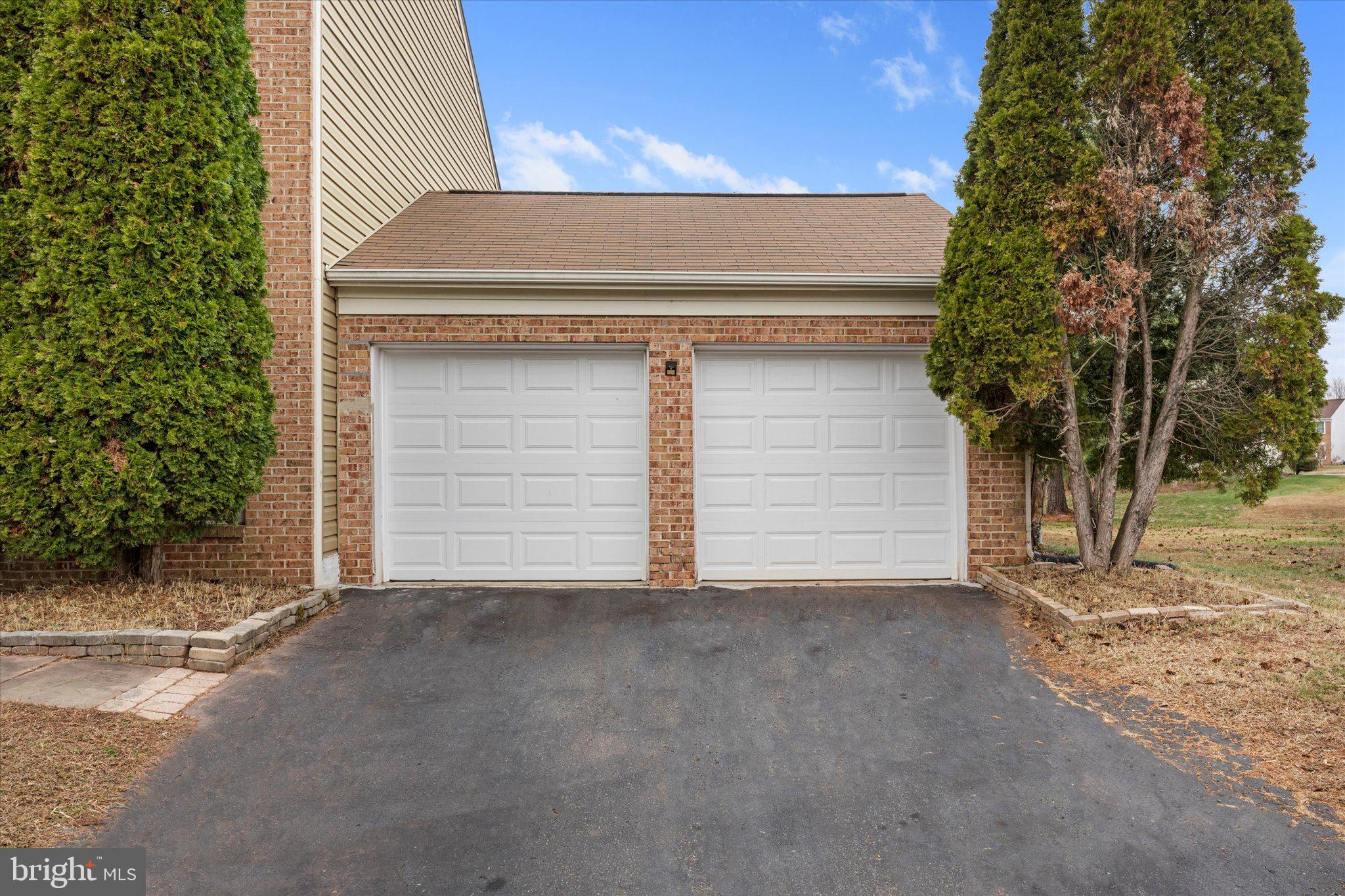 10140 Forest Hill Circle Manassas, VA 20110 - Photo 3 of 42 a view of house and garage