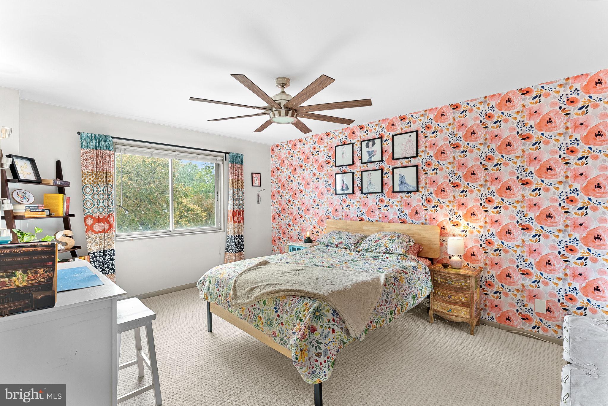 5340 Holmes Run Parkway, Unit 400 Alexandria, VA 22304 - Photo 16 of 40 a bedroom with a bed mirror and a window