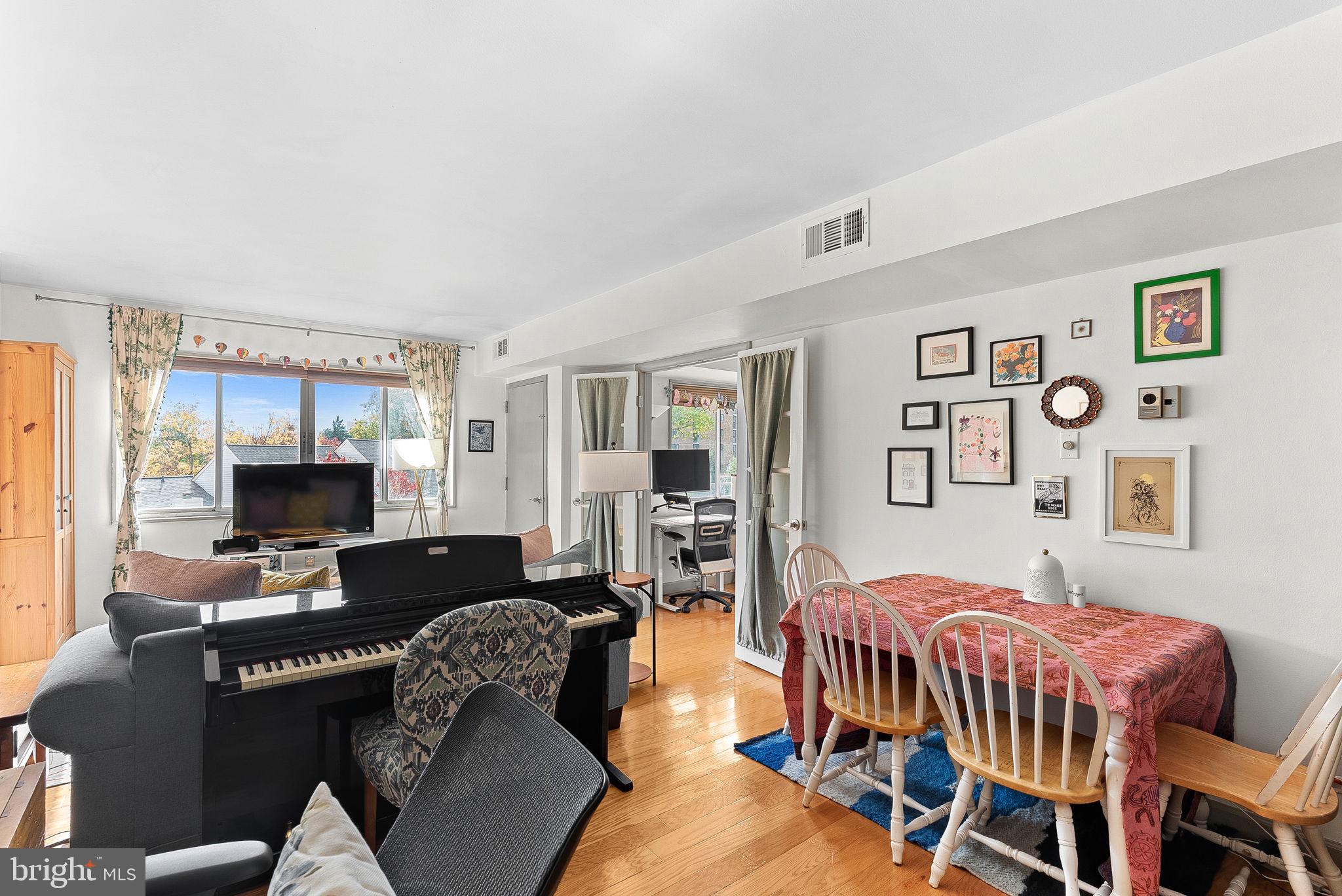 5340 Holmes Run Parkway, Unit 400 Alexandria, VA 22304 - Photo 6 of 40 a bedroom with furniture and a window