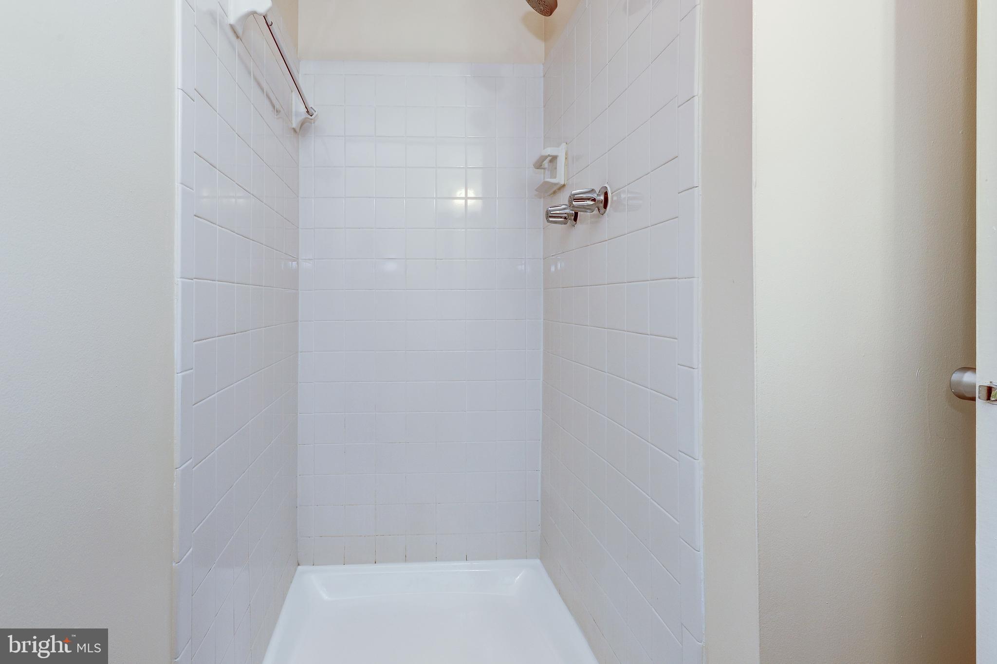 6250 Edsall Road, Unit 203 Alexandria, VA 22312 - Photo 18 of 31 a bathroom with a shower