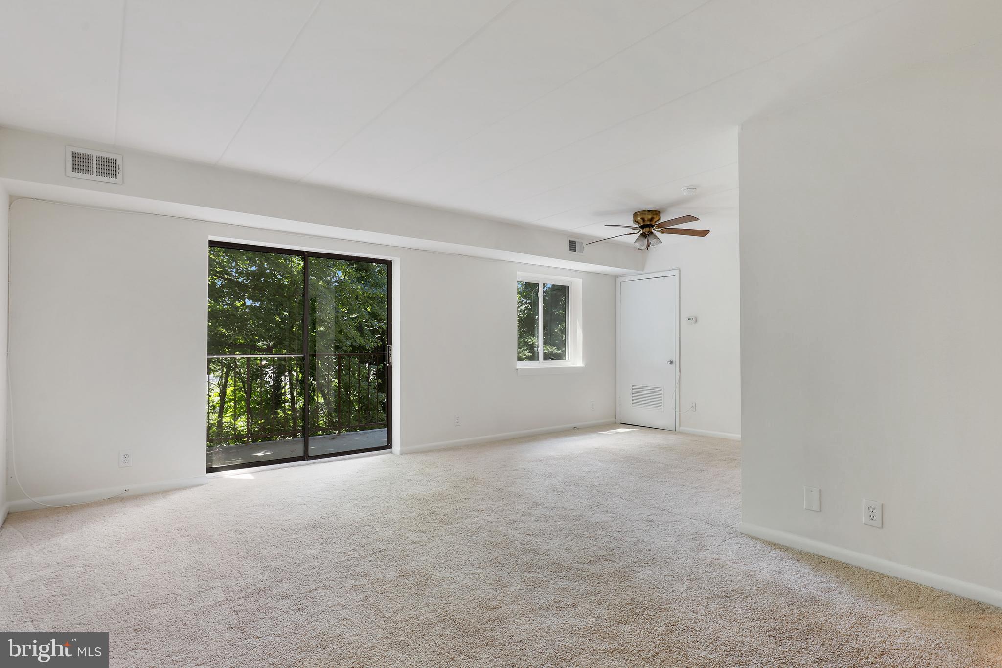 6250 Edsall Road, Unit 203 Alexandria, VA 22312 - Photo 4 of 31 an empty room with windows