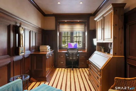 a living room with furniture fireplace and flat screen tv