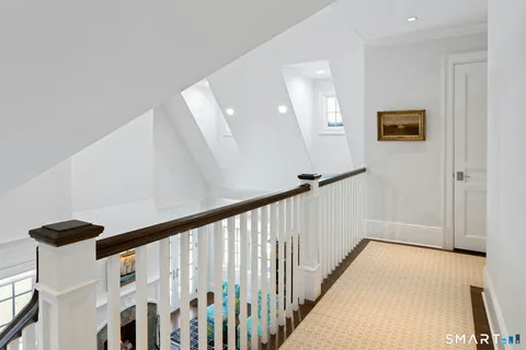 a view of hallway with stairs