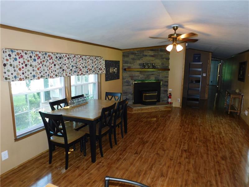189 Line Road Mercer, PA 16137 - Photo 15 of 25 STONE WALL WOOD BURNER/ ALL NEWER FLOORING