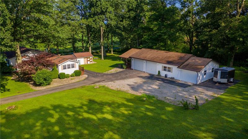 189 Line Road Mercer, PA 16137 - Photo 3 of 25 3 CAR GARAGE WITH WORKSHOP AND COVERED DECK OFF GARAGE