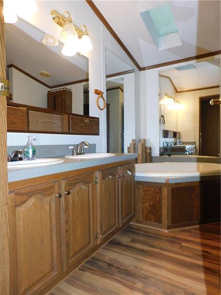 189 Line Road Mercer, PA 16137 - Photo 22 of 25 MAIN BATH SHOWER AROUND CORNER/DOUBLE BOWL SINK/CORNER TUB