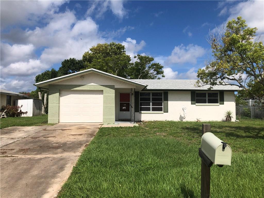 10401 Oleander Drive Port Richey, FL 34668 - Photo 1 of 1 Front elevation - NEW ROOF and exterior painted in 2018