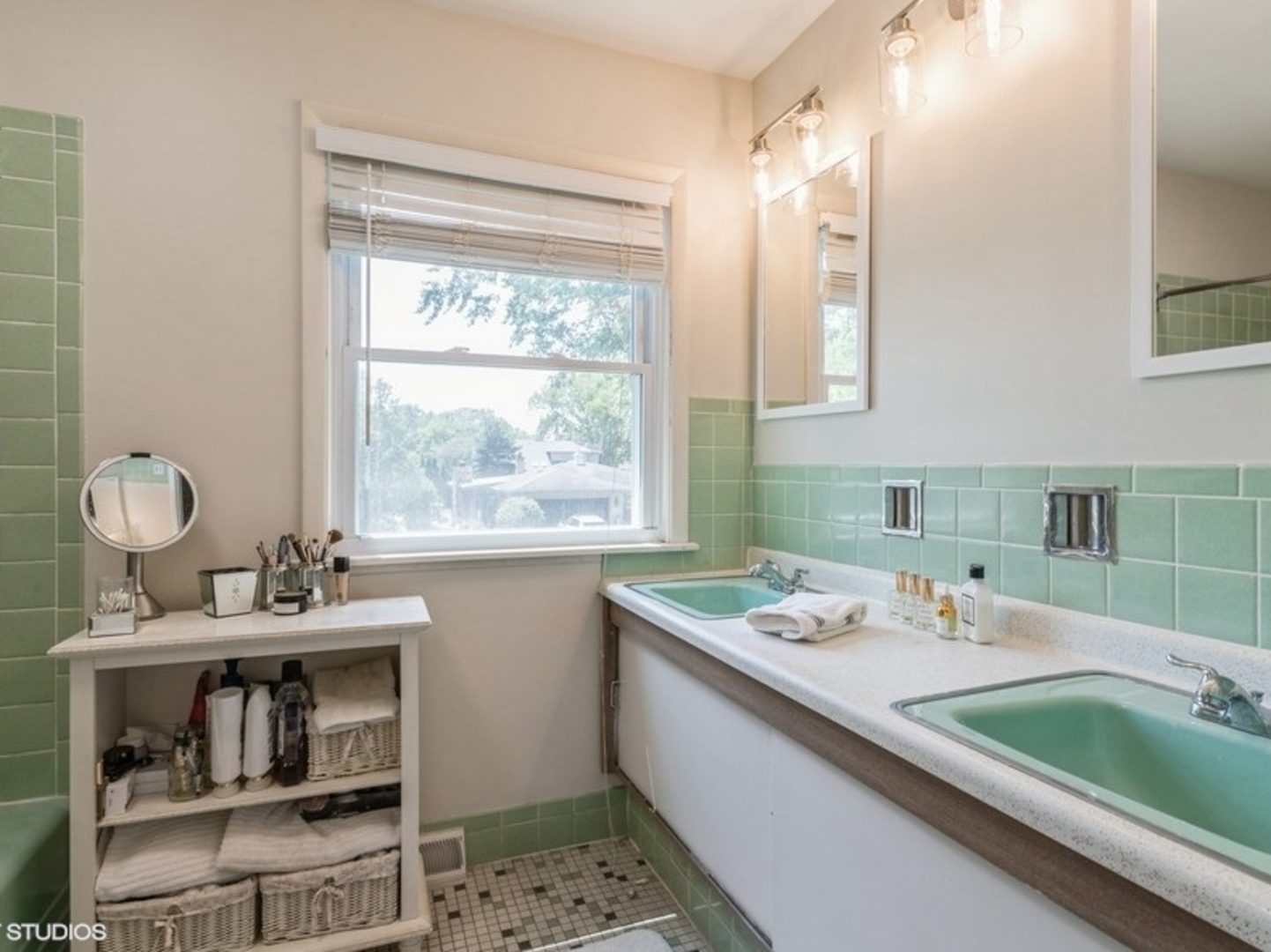 2220 Walnut Street Park Ridge, IL 60068 - Photo 15 of 25 a bathroom with a granite countertop sink a large mirror and a window