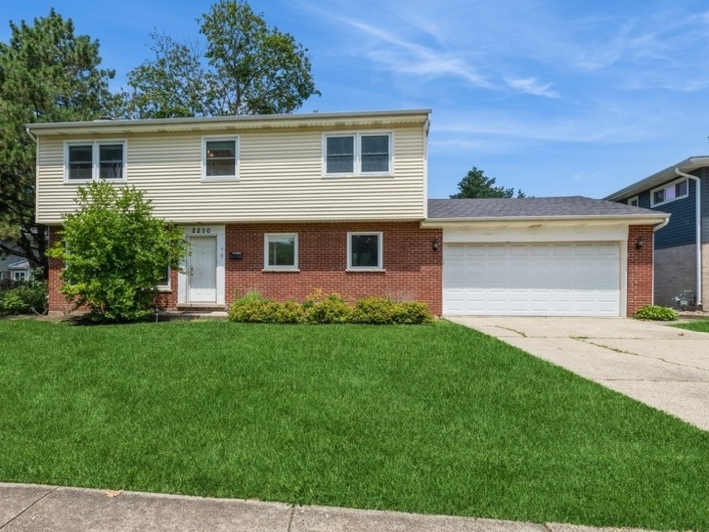 2220 Walnut Street Park Ridge, IL 60068 - Photo 25 of 25 a front view of a house with a yard and garage