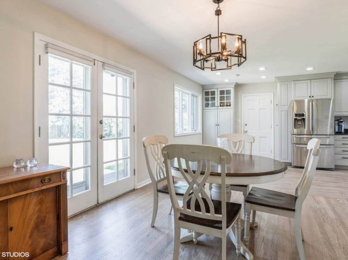 2220 Walnut Street Park Ridge, IL 60068 - Photo 5 of 25 a view of a dining room with furniture window and wooden floor