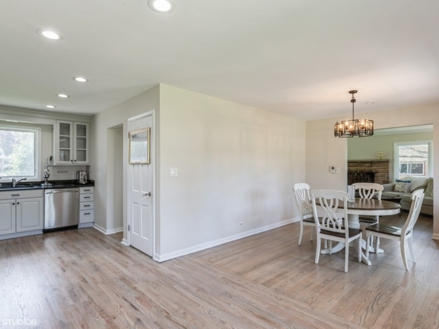 2220 Walnut Street Park Ridge, IL 60068 - Photo 7 of 25 a view of a dining room with furniture and wooden floor