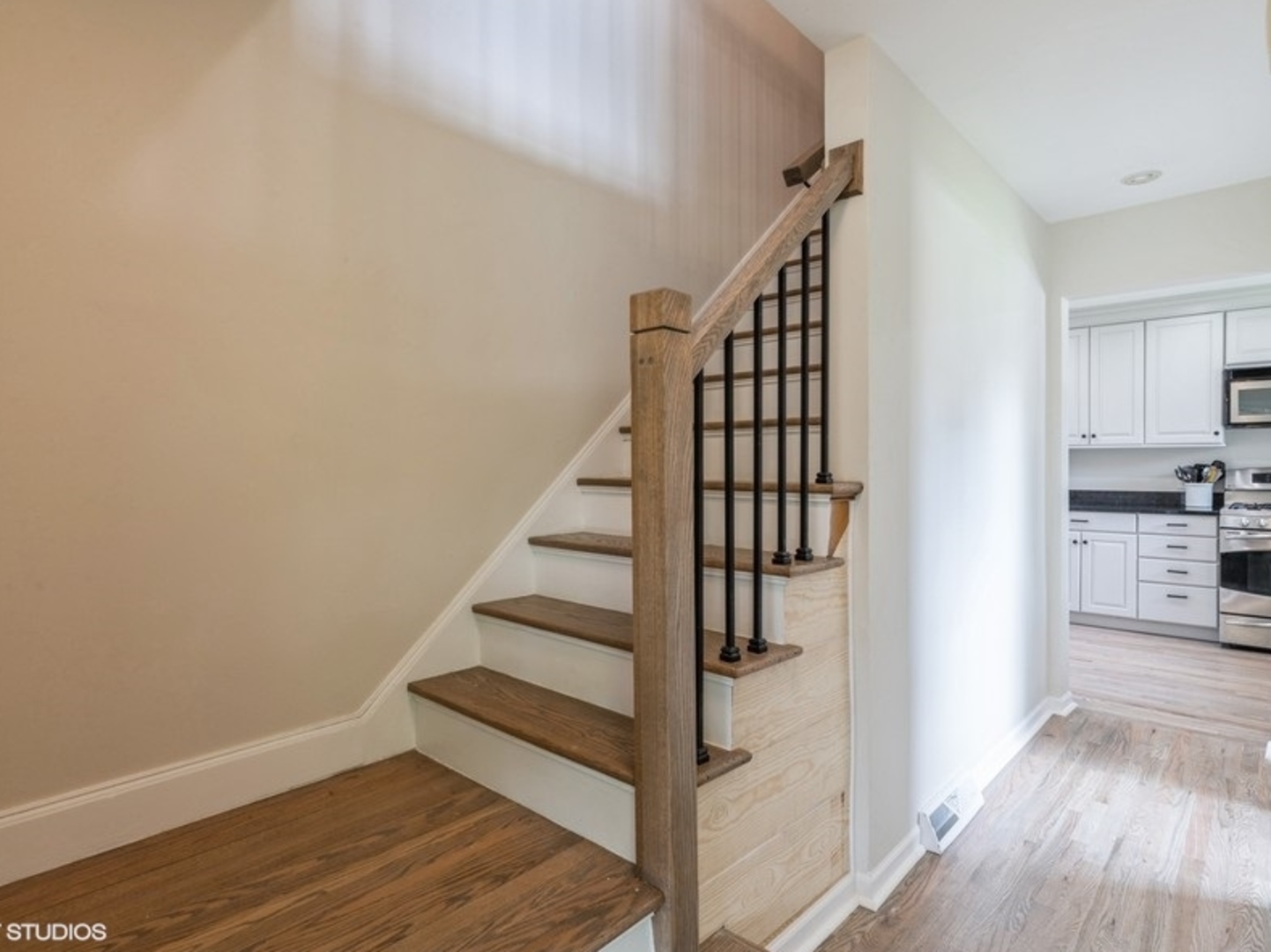 2220 Walnut Street Park Ridge, IL 60068 - Photo 8 of 25 a view of entryway and hall with wooden floor