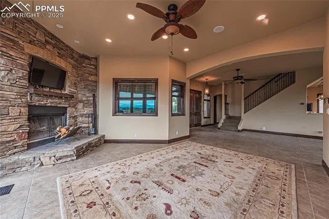 a kitchen with stainless steel appliances granite countertop a stove and a refrigerator