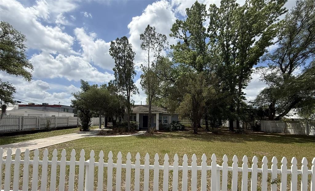 5305 Whiteway Drive Temple Terrace, FL 33617 - Photo 2 of 22 a front view of a building with trees
