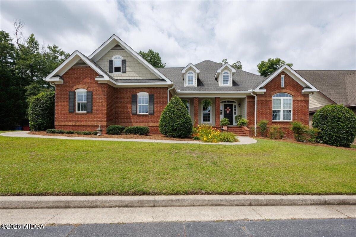 210 Oberon Place Macon, GA 31210 - Photo 3 of 31 a front view of a house with a yard