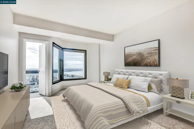 a bathroom with a shower sink and mirror