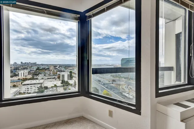 a view of balcony with furniture