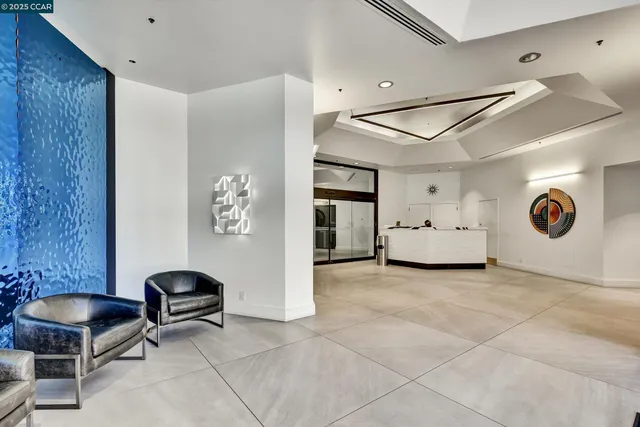 a living room with a couch and a large window